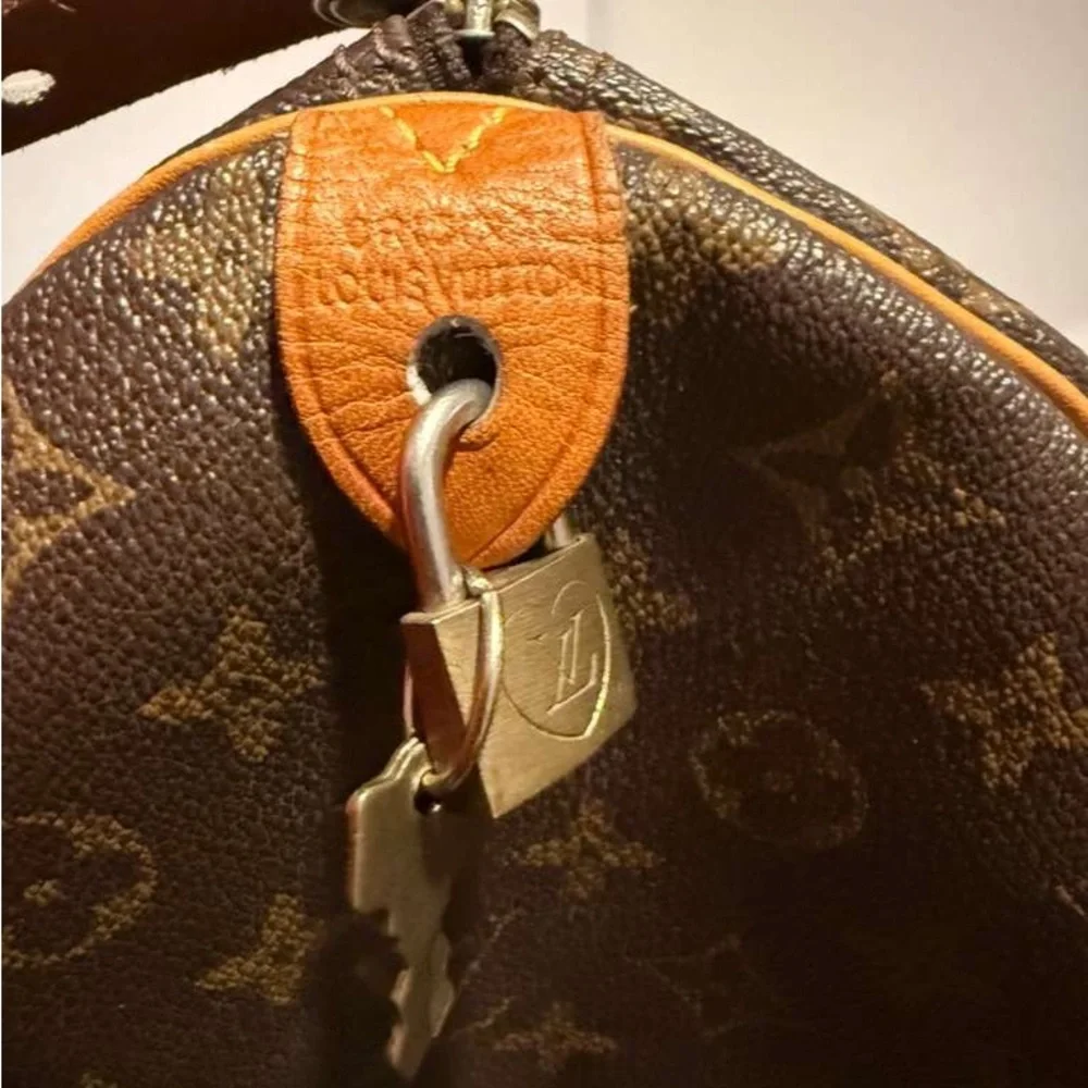 Louis Vuitton Brown and Tan Monogram Duffel Bag - Picture 7 of 11